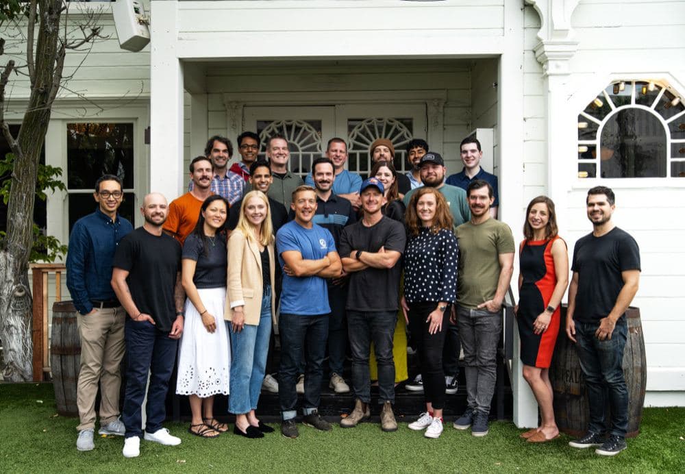 Curri leadership team gathered for a 2023 company offsite — founders Matt Lafferty and Brian Gonzalez with their executive team