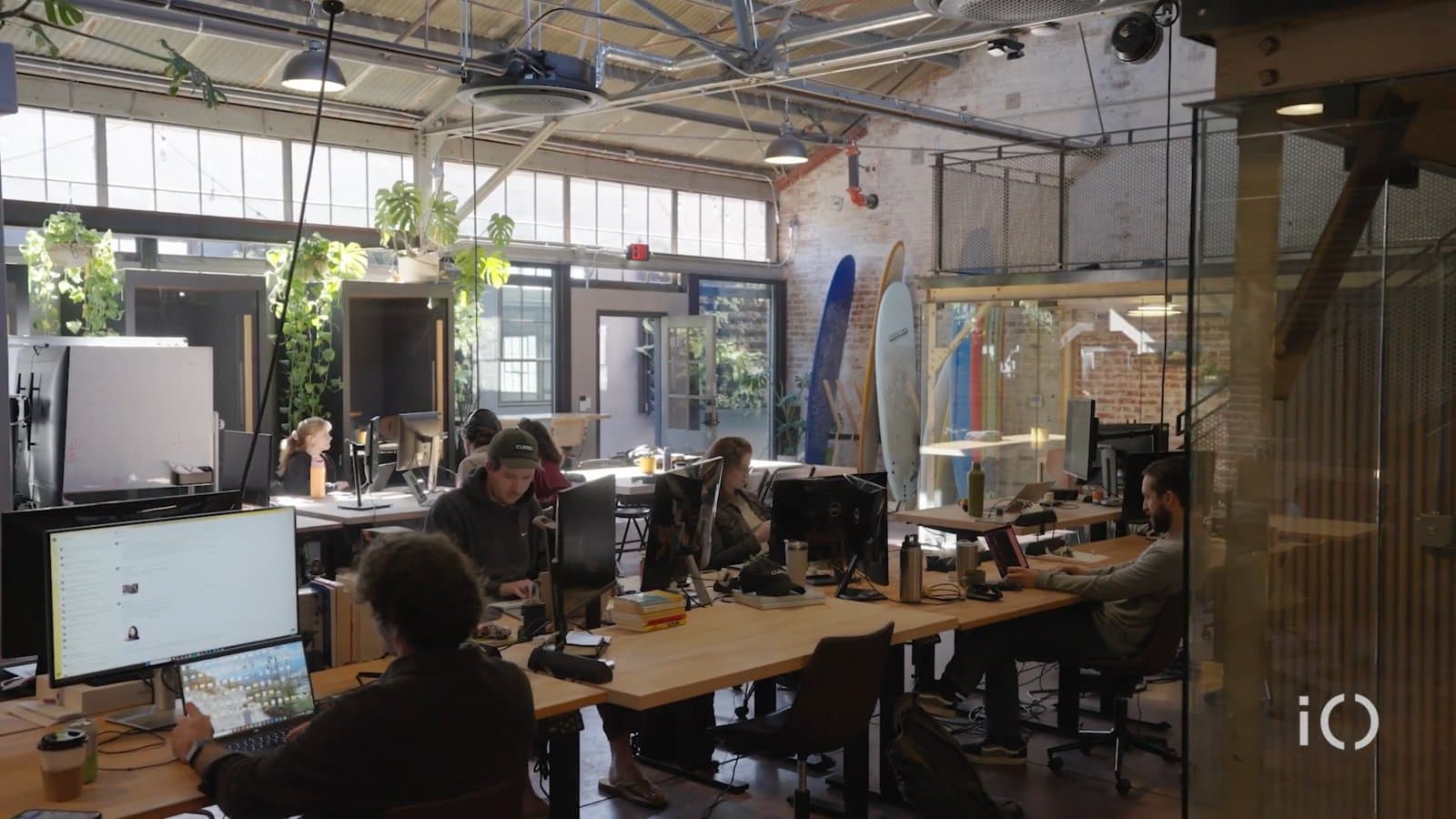 Inside Curri's HQ — team members working at the Ventura headquarters