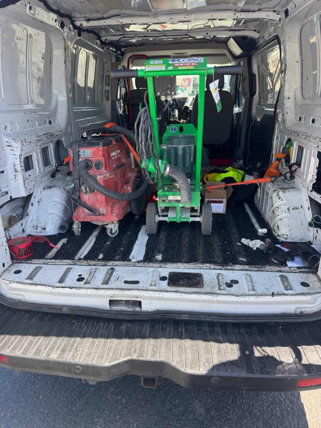 Sprinter Van cargo bay loaded with bulky equipment ready for a Curri last-mile delivery