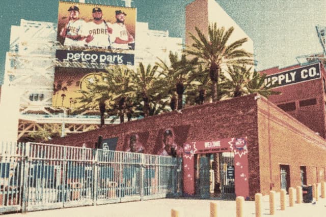 Entrance at the Gaslamp Gate with the red brick Western Metal Supply Co. building